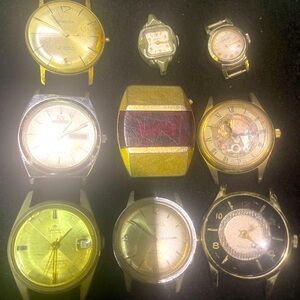 Gold and Silver Wearable Watch Collection